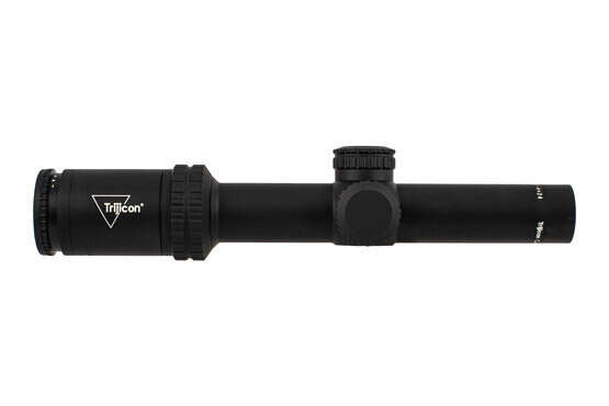 Trijicon 1-4x24mm Credo rifle scope features a 30mm tube and capped turrets with red illuminated MRAD ranging reticle.